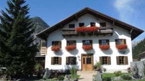 Trudis Hoamat, Bach, Österreich